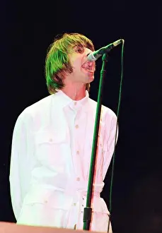 Oasis Prints: Liam Gallagher performing live onstage with Oasis on the first night at Knebworth