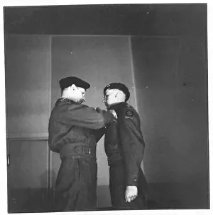 21st Prints: Lieutenant D.O. Owen of the 2nd Derby Yeomanry receives the Military Cross during an investiture ceremony of the 51st