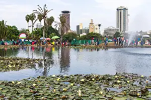 Nairobi Prints: Lily lake with people walking by