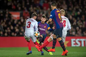 Sevilla Prints: Lionel Messi of Barcelona, second right