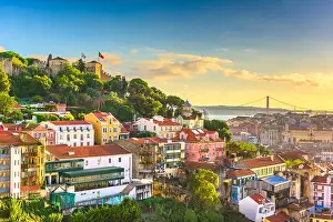 Lisbon, Portugal City Skyline with Sao Jorge Castle before sunset