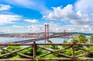 Suspension Prints: Lisbon, Portugal - Landscape of the 25th of April bridge over the Tagus river estuary into Lisbon skyline as seen
