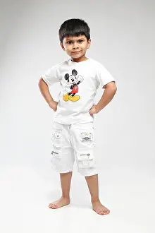 One Boy Only Prints: Little 5 year old Indian kid standing with hands on waist