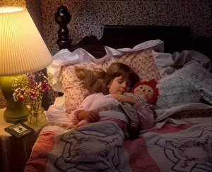 Illustrate Prints: Little girl sleeping in bed with Raggedy Ann doll
