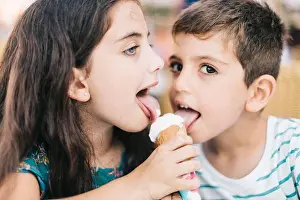 Ice Cream Prints: Two little kids eating an ice cream together