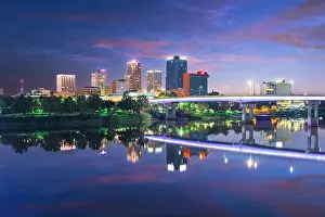 Little Rock, Arkansas, USA downtown skyline on the Arkansas River at dawn