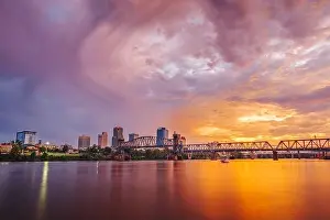 Little Rock, Arkansas, USA downtown skyline on the Arkansas River at dawn