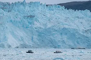 Polar Regions Prints: Little ship floating between the ice below the Eqi glacier