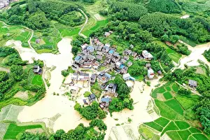 Flood Prints: LIUZHOU, CHINA - JUNE 13, 2022 - Some crops were flooded in Dongtan Tun