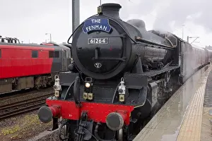 Terminus Prints: Former LNER class B1 steam locomotive 61264 at a rainy Norwich station platform
