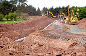 Environmental Issues Prints: LNG pipeline being constructed over farmland near Trecastle Powys South Wales UK GB EU