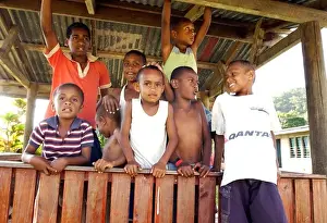 The Village Prints: Local children play in the village of Korolevu on the Coral Coast Fiji
