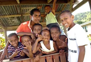 Locals Prints: Local children play in the village of Korolevu on the Coral Coast Fiji