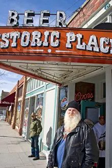Saloon Prints: Local man in leather jacket stands outside saloon on Ogden's historic 25th Street