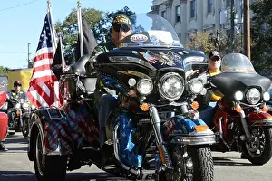 Charleston Prints: Local motorcycle community members ride in support of military veterans during the Veterans Day parade in Charleston