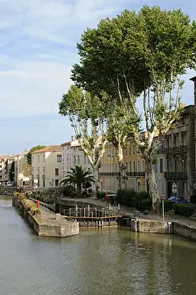 Upright Prints: Lock gates on the Canal de la Robine in the centre of Narbonne South of France