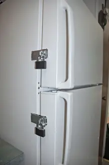 Dietary Prints: locks on a refrigerator door to keep someone on their diet