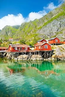 Images Dated 4th July 2014: Lofoten Islands, traditional red wooden rorbu hut on Moskenesoya Island, Norway