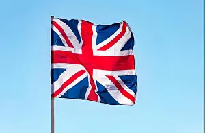 Union Jack Prints: London, Great Britain flag waving against blue sky, the British flag