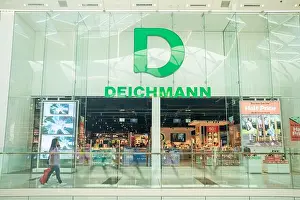 Shoppers Prints: LONDON- JULY 29, 2024: Deichmann shoe shop chain inside Westfield London in White City