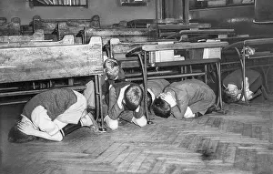 Practicing Prints: These London schoolchildren in an air raid drill as a precaution in case an air raid comes too fast to give them a
