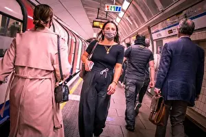 Masks Prints: London- September, 2020: People in the London Underground wearing covid 19 face masks