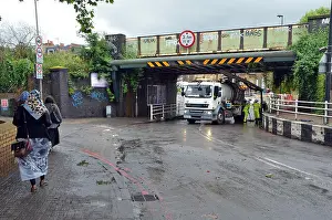 Flooding Prints: London, UK. 23rd June, 2016. Latchmere road pumped out after being flooded and closed after a night of storms