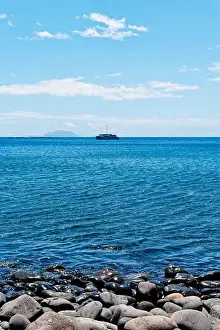Ocean Breeze Prints: A lone boat sailing on the calm
