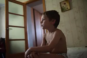 Difficulty Prints: lonely little boy sitting in the room with no clothes on
