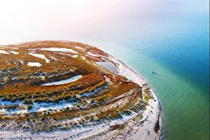 Lonely yacht near the beach on the coast of Black sea in Dgarilgach island, Ukraine. Landscape photography