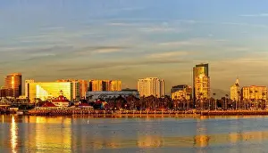 Coastal City Prints: The Long Beach skyline glows under the golden hour light