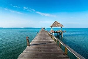Images Dated 10th December 2017: Long wooden bridge in beautiful tropical island beach - Koh Mak in Trat, Thailand