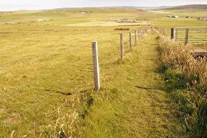 Looking down the footpath from Marwick Head to Brockan, across farms and farmland, Orkney, Scotland UK