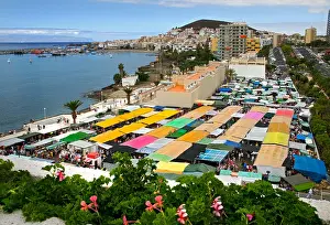 Watches Prints: LOS CRISTIANOS MARKET High overview of the colourful busy market stalls at the popular Sunday market in Los Cristianos