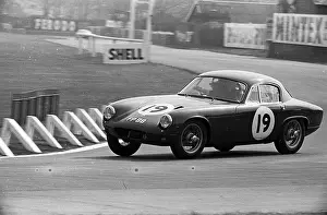 Racer Prints: A Lotus Elite racing into Tatt's Corner in the Aintree 200 race, England 30 April 1960