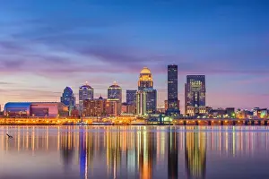 Louisville, Kentucky, USA downtown skyline at the river at dusk