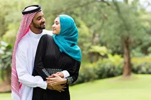 Head Scarf Prints: lovely Arabian couple embracing outdoors