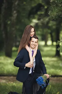 Park Street Prints: Loving Couple. Boy and girl walking in the beautiful park