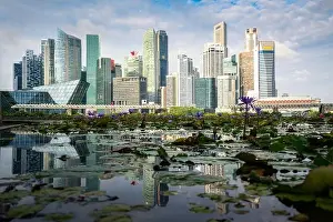 Low angle view of Singapore business district skyline and office skyscraper at day in Marina bay, Asian tourism, modern city life, or business finance