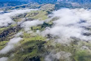 A low blanket of clouds drifts slowly over the rural landscape of central Oregon. This region is known for its beautiful rural communities