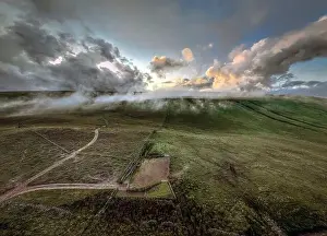 Low cloud known locally as dragon's breath at sunset on the Brecon Beacons in South Wales UK