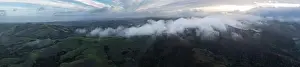 Low clouds drift across the rolling hills found east of San Francisco Bay, CA. This dry region turns green during the winter months due to rain