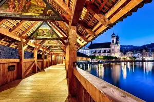 Lucerne city, Switzerland, view of Jesuit church from historical wooden Chapel Bridge