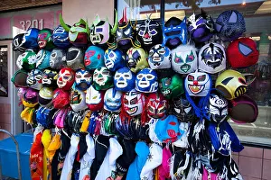 Masks Prints: Lucha Libre Mexican masks on display, Mission District, San Francisco, California, USA