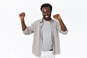 Bristle Prints: Lucky happy handsome african american bearded guy do champion dance
