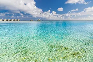 Seychelles Prints: Luxury beach scene with water bungalows and amazing blue lagoon or tropical sea