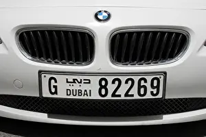 Emirate Prints: luxury car BMW with Dubai license plate. Photo by Willy Matheisl