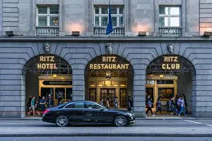 Posh Prints: A luxury car passes the entrance to the Ritz Restaurant at 150 Piccadilly