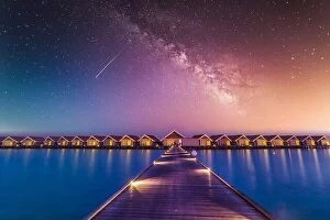 Images Dated 7th January 2017: Luxury over water villas, bungalows sea ocean with beach at night sunset time, Milky Way