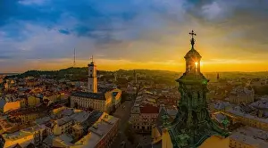 Lwow Prints: Lviv, Ukraine - August 24, 2020: Aerial view on City Hall and Latin Cathedral in Lviv